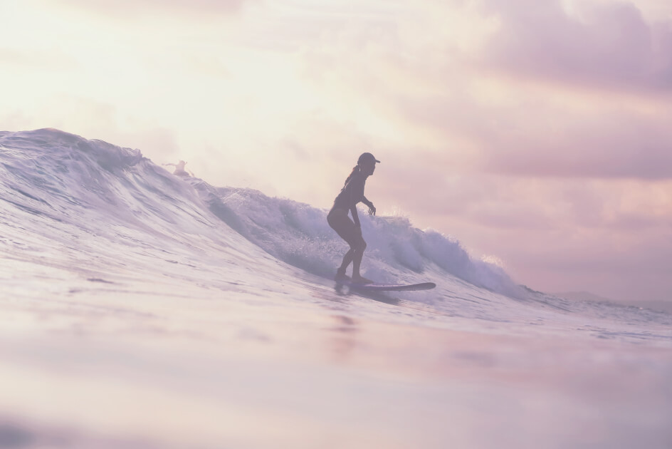 Picture of a woman surfing